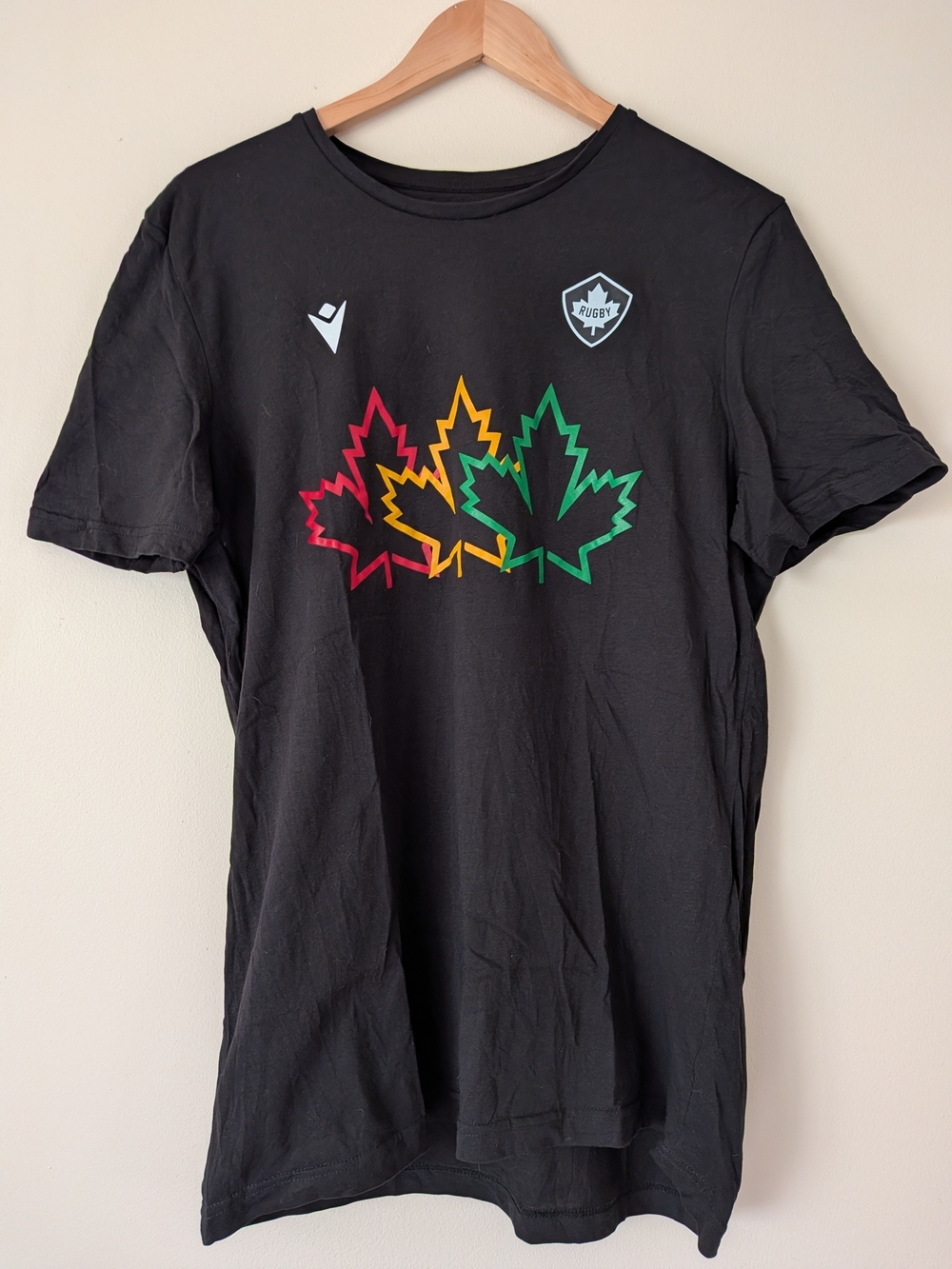 MACARON Black Tee with Red, Yellow & Green Maple Leaf Graphic